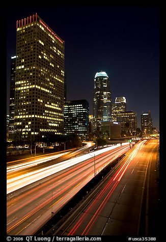 Traffic on Harbor Freeway and skyline at night. Los Angeles, California, USA