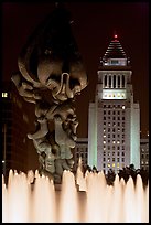 Peace on Earth sculpture, fountain, and City Hall at night. Los Angeles, California, USA (color)