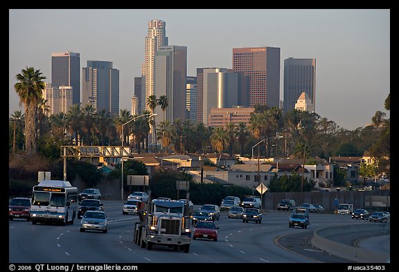 Traffic on freeway and skyline, early morning. Los Angeles, California, USA (color)