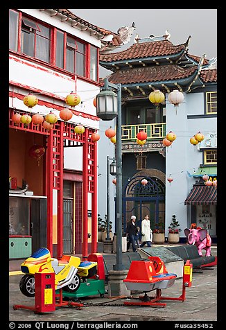 Rides and buildings in Chinese style, Chinatown. Los Angeles, California, USA (color)