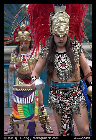 Aztec dancers performing, El Pueblo historic district. Los Angeles, California, USA (color)
