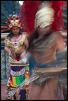Aztec dancers with motion blur. Los Angeles, California, USA
