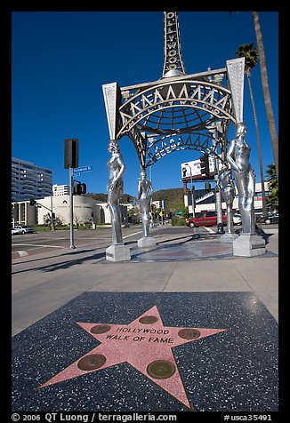 Star from the Hollywood walk of fame and gazebo with statues of actresses. Hollywood, Los Angeles, California, USA (color)
