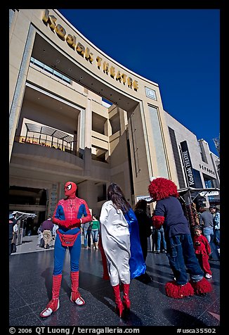 People dressed as movie characters in front of the Kodak Theatre. Hollywood, Los Angeles, California, USA (color)