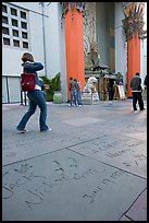 Footprints and handprints of Jack Nicholson in the Grauman theatre forecourt. Hollywood, Los Angeles, California, USA ( color)