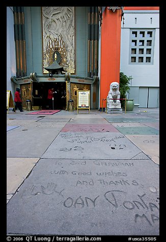 Handprints and footprints of actors and actresses in cement, Grauman theater forecourt. Hollywood, Los Angeles, California, USA (color)