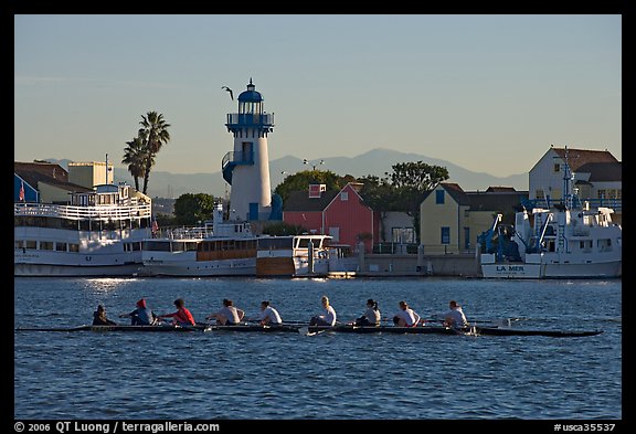 Women Rowers and lighthouse, early morning. Marina Del Rey, Los Angeles, California, USA