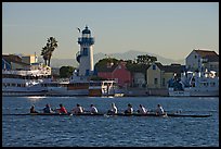Women Rowers and lighthouse, early morning. Marina Del Rey, Los Angeles, California, USA