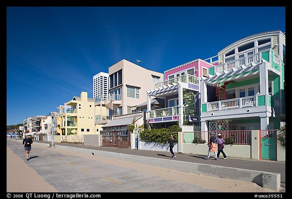 People jogging and strolling on beach promenade. Santa Monica, Los Angeles, California, USA