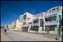 People jogging and strolling on beach promenade. Santa Monica, Los Angeles, California, USA (color)