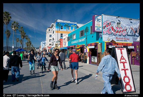 Rollerblading on colorful Ocean Front Walk. Venice, Los Angeles, California, USA