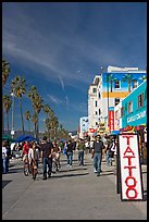 Tatoo sign and colorful Ocean Front Walk. Venice, Los Angeles, California, USA ( color)