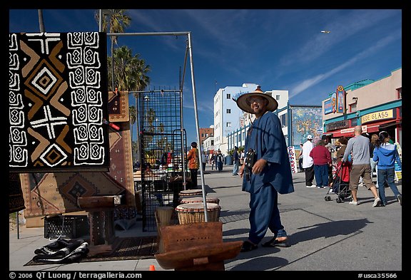 Man selling crafts on Venice Boardwalk. Venice, Los Angeles, California, USA