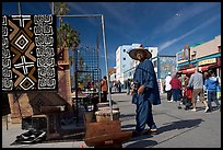 Man selling crafts on Venice Boardwalk. Venice, Los Angeles, California, USA