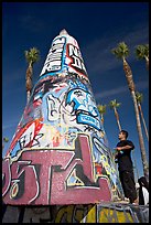 Man creating  graffiti art. Venice, Los Angeles, California, USA (color)