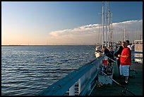 Fishing in the Port of Redwood, late afternoon. Redwood City,  California, USA