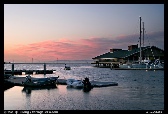 Marina, with small boat comming back to port at sunset. Redwood City,  California, USA (color)