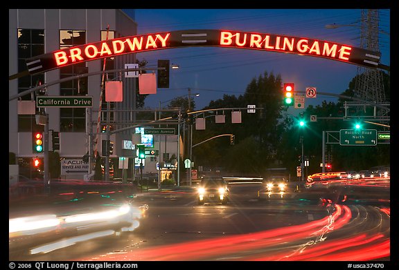 Broadway at night with lights from moving cars. Burlingame,  California, USA (color)