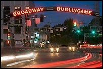 Broadway at night with lights from moving cars. Burlingame,  California, USA (color)