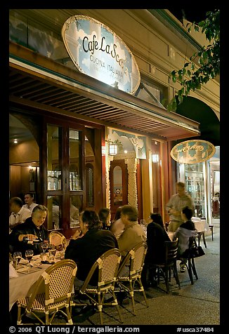 Italian restaurant with diners by night. Burlingame,  California, USA