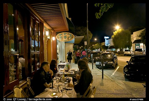 Sidewalk with Outdoor restaurant table and people walking. Burlingame,  California, USA