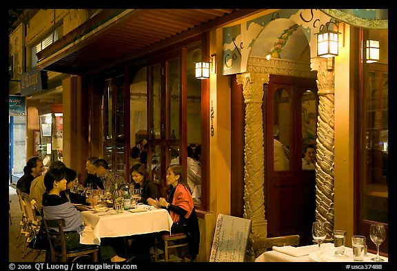 Outdoor table of Italian restaurant at night. Burlingame,  California, USA (color)