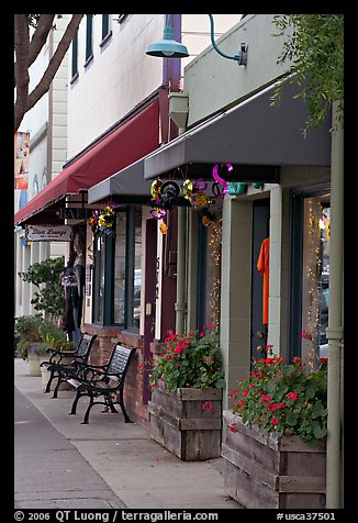 Storefront and public benches on Main Street. Half Moon Bay, California, USA (color)