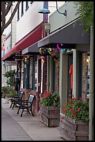 Storefront and public benches on Main Street. Half Moon Bay, California, USA