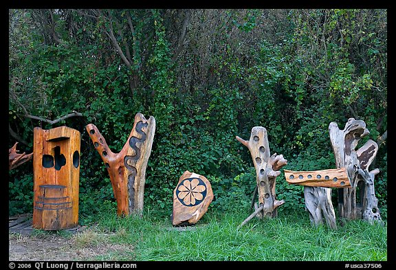 Wood carvings in garden. Half Moon Bay, California, USA (color)