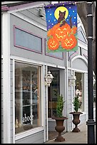 Storefront on Main Street with Halloween street decor. Half Moon Bay, California, USA