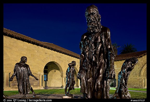 Rodin Burghers of Calais in the Main Quad at night. Stanford University, California, USA