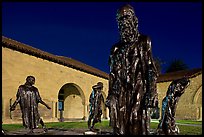 Rodin Burghers of Calais in the Main Quad at night. Stanford University, California, USA