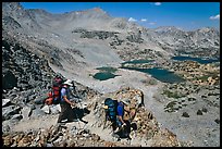 Backpackers descending from Bishop Pass, John Muir Wilderness. California, USA