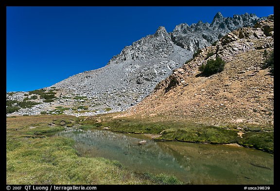 Stream and colorful rocks on Inconsolable Range. California, USA