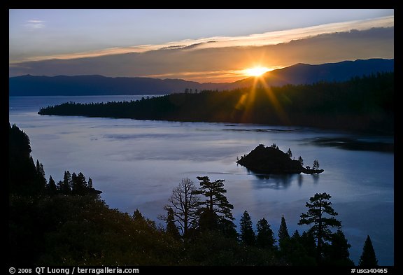 Sun shining under clouds, Emerald Bay and Lake Tahoe, California. USA