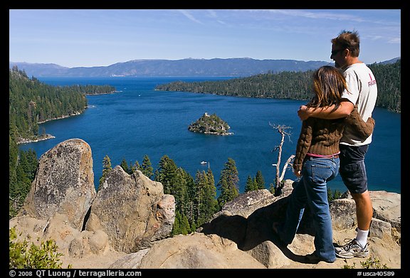 Couple standing above Emerald Bay, Lake Tahoe, California. USA (color)