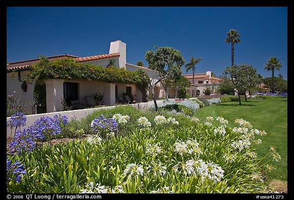 Mediterranean-style houses, flowers, and palm trees. Santa Barbara, California, USA (color)