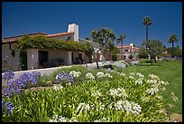 Mediterranean-style houses, flowers, and palm trees. Santa Barbara, California, USA