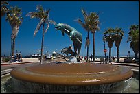 Dolphin fountain and beach. Santa Barbara, California, USA (color)