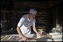 Baker preparing San Francisco sourdough bread. San Francisco, California, USA