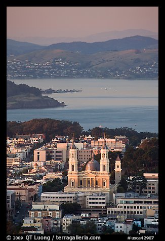 St Ignatius church, USF, and San Francisco Bay at sunset. San Francisco, California, USA (color)