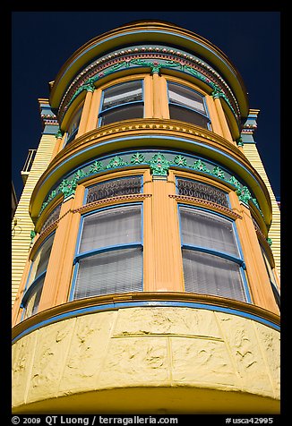 Brightly painted yellow tower of Victorian house, Haight-Ashbury District. San Francisco, California, USA (color)