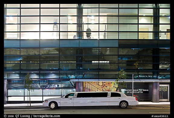 Limousine and glass building. San Francisco, California, USA
