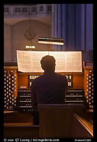 Musician playing organ, Grace Cathedral. San Francisco, California, USA (color)