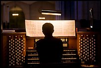 Organist and musical score, Grace Cathedral. San Francisco, California, USA