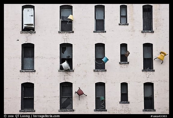 Facade with chairs installed as art. San Francisco, California, USA (color)