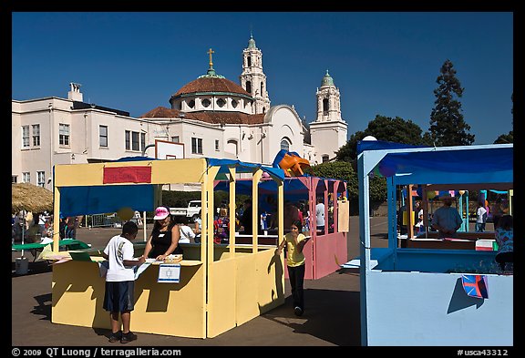 School fair booths and Mission Dolores in the background. San Francisco, California, USA (color)