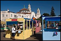 School fair booths and Mission Dolores in the background. San Francisco, California, USA