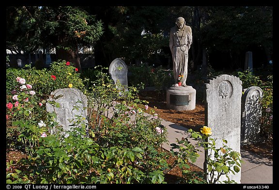 Gravestones and statue, Mission Dolores. San Francisco, California, USA (color)