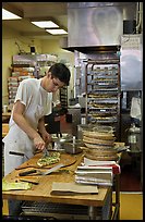 Man preparing pizza, Haight-Ashbury district. San Francisco, California, USA (color)